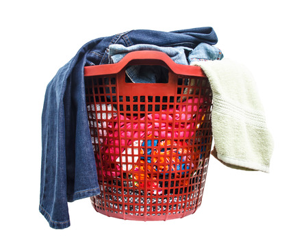 The clothes are not washed in red  plastic basketの写真素材