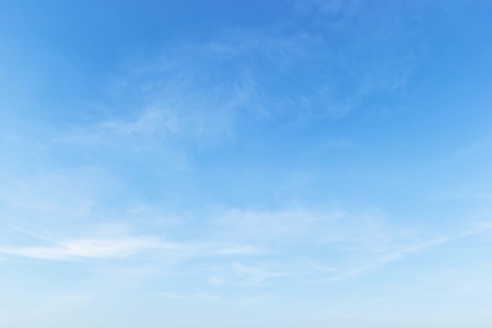 Fantastic soft white clouds against blue skyの写真素材