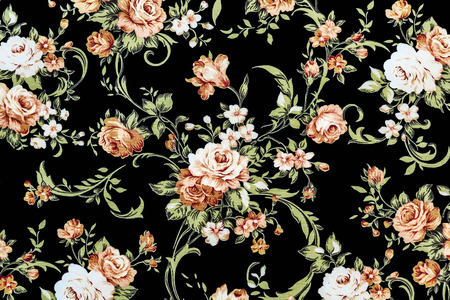Rose Fabric background, Fragment of colorful retro tapestry textile pattern with floral ornament useful as backgroundの写真素材