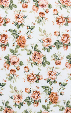 Rose Fabric background, Fragment of colorful retro tapestry textile pattern with floral ornament useful as backgroundの写真素材