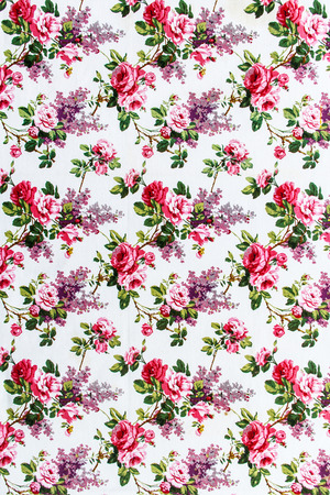 Red Rose Fabric Background, Fragment of colorful retro tapestry textile pattern with floral ornament useful as background の写真素材