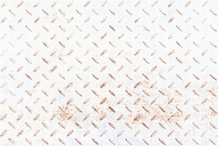 White metal rhombus shaped background and texture , with rust