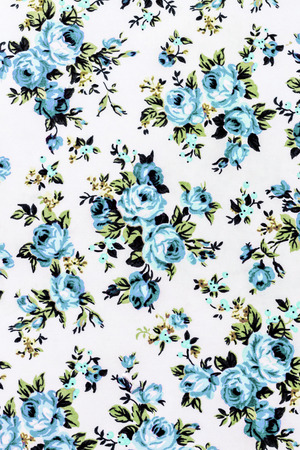 Blue rose fabric background, Fragment of colorful retro tapestry textile pattern with floral ornament useful as background の写真素材