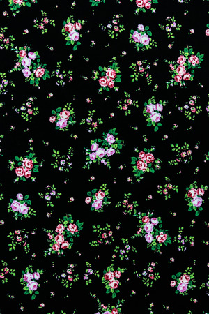 Rose Fabric background, Fragment of colorful retro tapestry textile pattern with floral ornament useful as backgroundの写真素材