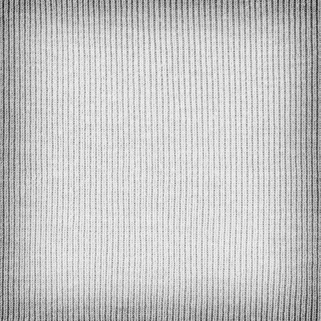 light gray knitted  fabric texture or background.の写真素材