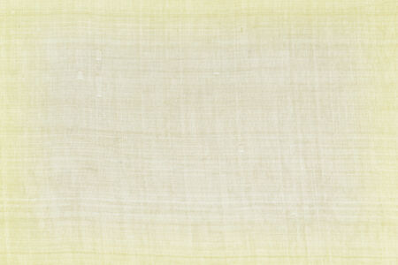 light yellow knitted  fabric texture or background.の写真素材