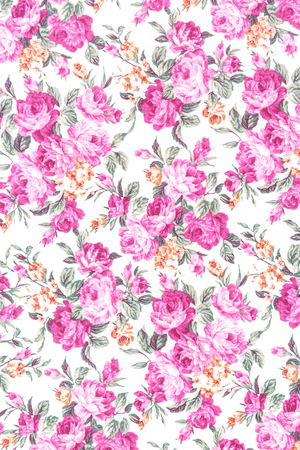 Pink rose fabric background, Fragment of colorful retro tapestry textile pattern with floral ornament useful as background.の写真素材