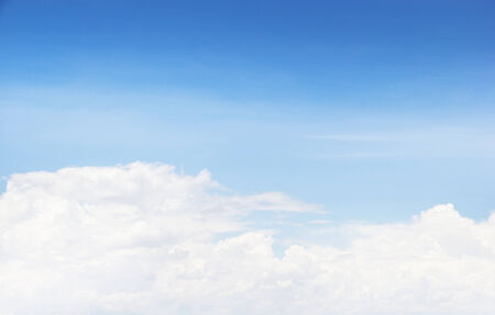 Fantastic soft white clouds against blue skyの写真素材