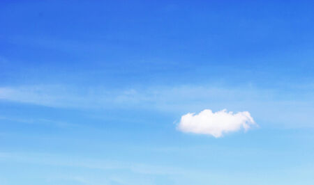 White clouds and fantastic soft white clouds against blue skyの写真素材