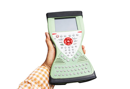 GPS Controller survey in hand lady asian, on white background, clipping path, Global Positioning System.の写真素材