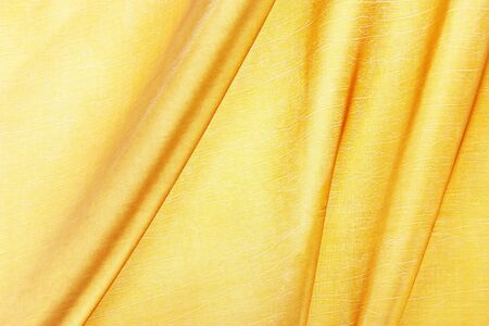 silk textured for background, gold color.の写真素材