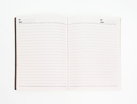 open notebook on white background.の写真素材