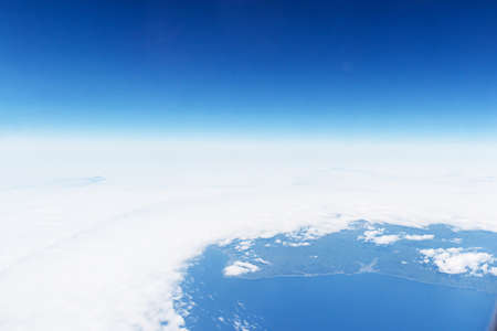 white clouds and blue sky, take a picture on the airplane.の写真素材