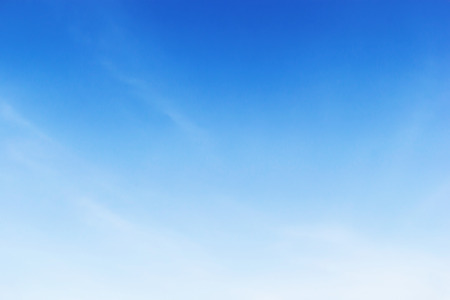 Fantastic soft white clouds against blue sky backgroundの写真素材