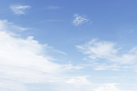 Fantastic soft white clouds against blue sky background, soft focus.の写真素材