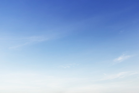 Fantastic soft white clouds against blue sky background.の写真素材