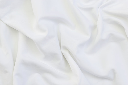 Close up of white bedding sheets with copy-space.の写真素材