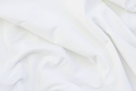 Close up of white bedding sheets with copy-space.の写真素材