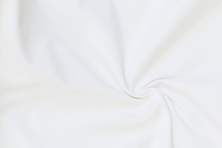 Close up of white bedding sheets and empty space.の写真素材