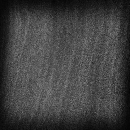 Dark gray black slate stone background or texture and empty space.の写真素材