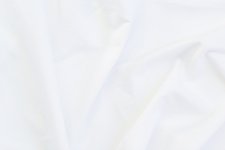 Close up of white bedding sheets and copy-spaceの写真素材