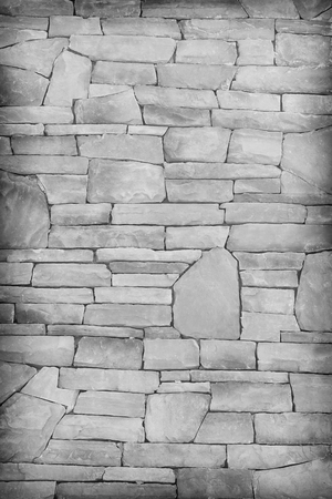 Gray brick wall as a background or texture and shadow.の写真素材