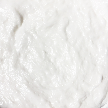 Cosmetics white cream background or texture close - up, for your design.の写真素材