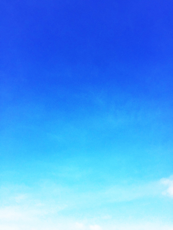 Blue sky background and empty space for your design, no cloud.の写真素材