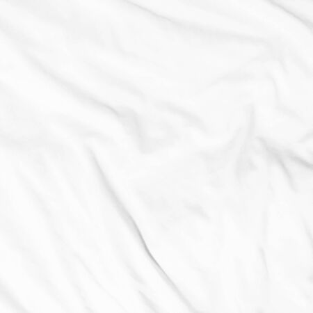 Close up of white bedding sheets and empty space.の写真素材