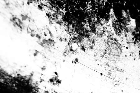 Grunge black and white abstract background or texture with distress scratchの写真素材