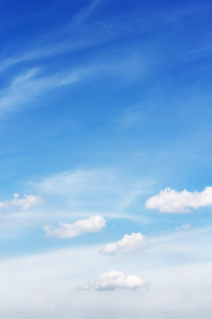 Soft white clouds against blue sky background, beautiful of natureの写真素材