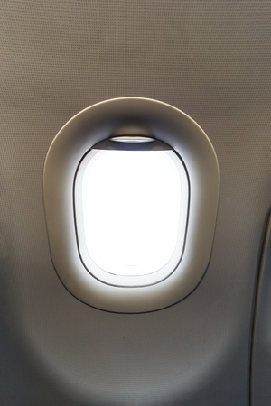 Airplane window single and sun ligthの写真素材