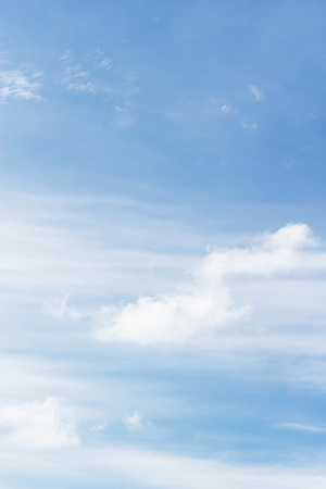 Soft white clouds against blue sky background and empty space for your designの写真素材