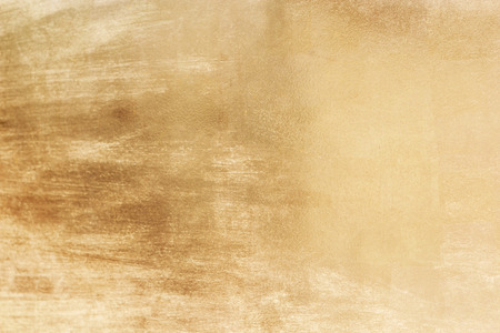 Gold abstract background or texture distress  scratch and gradients shadowの写真素材