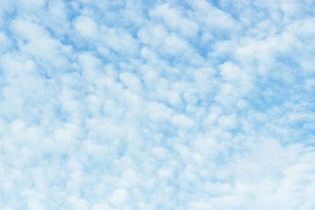 Soft white clouds against blue sky background, beautiful of natureの写真素材