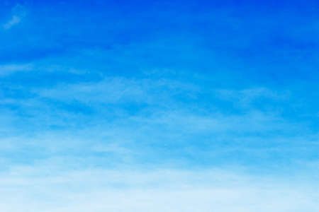 Soft white clouds against blue sky background for your design, beautiful of nature.の写真素材