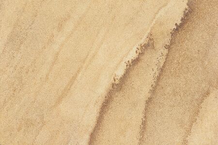 Yellow brown stone background or texture and empty spaceの写真素材