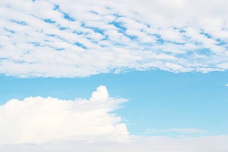 Blue sky and white clounds and empty space for your design.の写真素材