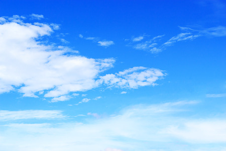 Soft white clouds against blue sky background for your design, beautiful of nature.の写真素材