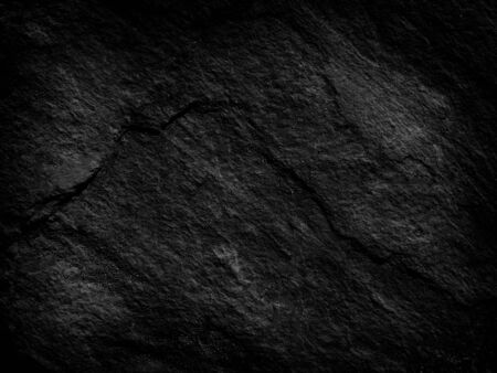 Dark gray black stone background or texture and gradients shadow with empty space.の写真素材