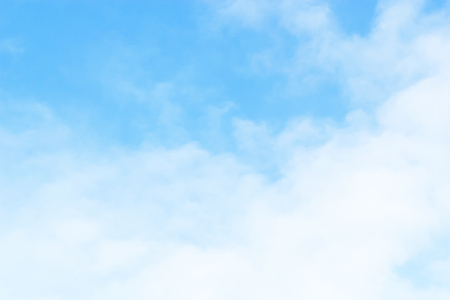 Soft white clouds against blue sky background and empty space for your design, beautiful of nature.の写真素材
