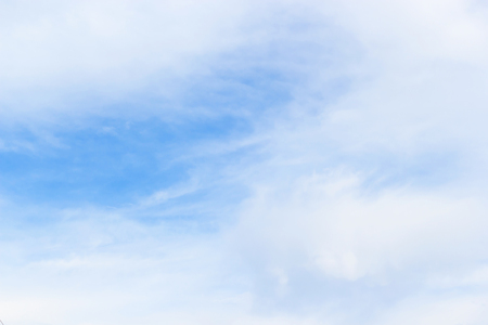 Soft white clouds against blue sky background for your design, beautiful of nature.の写真素材