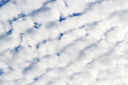 White clouds against blue sky background.の写真素材