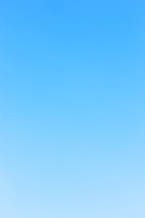 Blue sky background and empty space for your design, no cloud.の写真素材