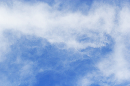 Soft white clouds against blue sky background, beautiful of nature.の写真素材