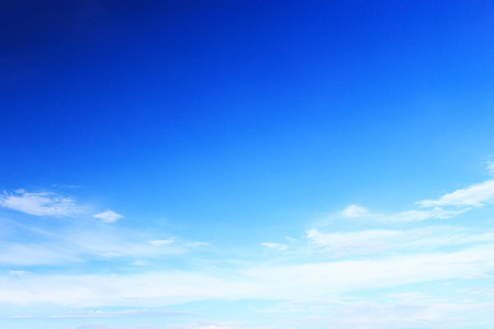 Blue sky background and white clouds soft focus, beautiful of nature.の写真素材