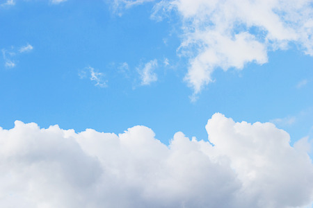 Soft white clouds against blue sky background and copy space.の写真素材