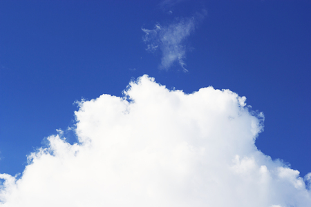 Blue sky and soft white clounds and empty space for your design. の写真素材