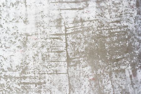 Concrete gray wall and white paint for background.の写真素材