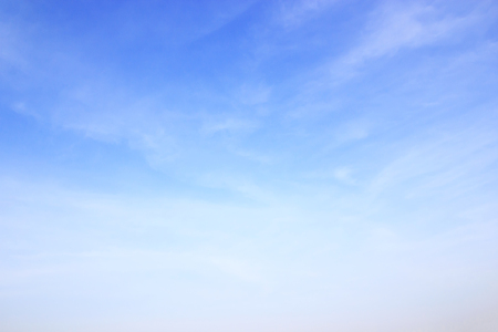Blue sky and soft white clounds and empty space for your design.の写真素材